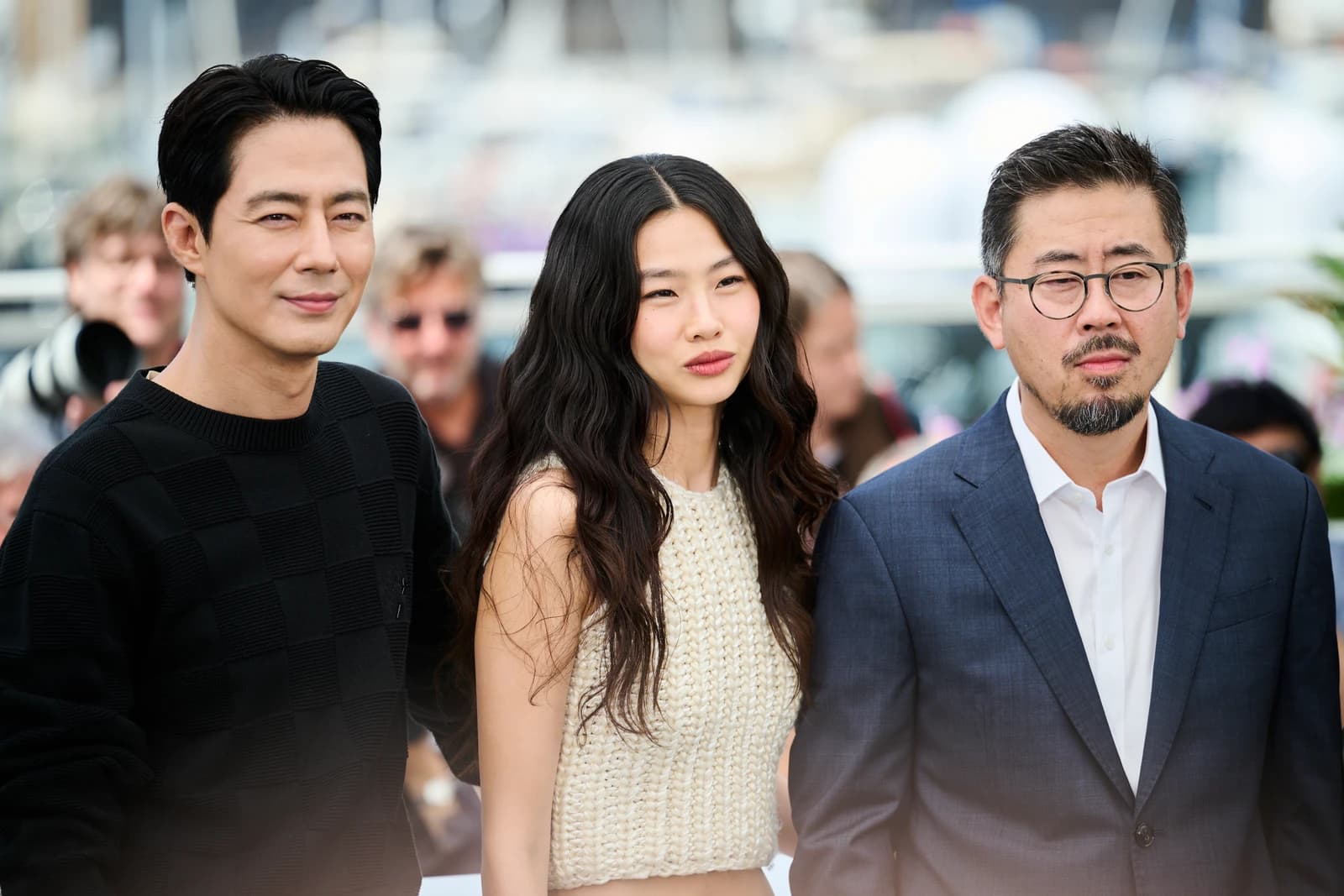 Zo In-sung, Jung Ho-yeon and director Na Hong-jin at the HOPE photocall in Cannes on May 18, 2026
